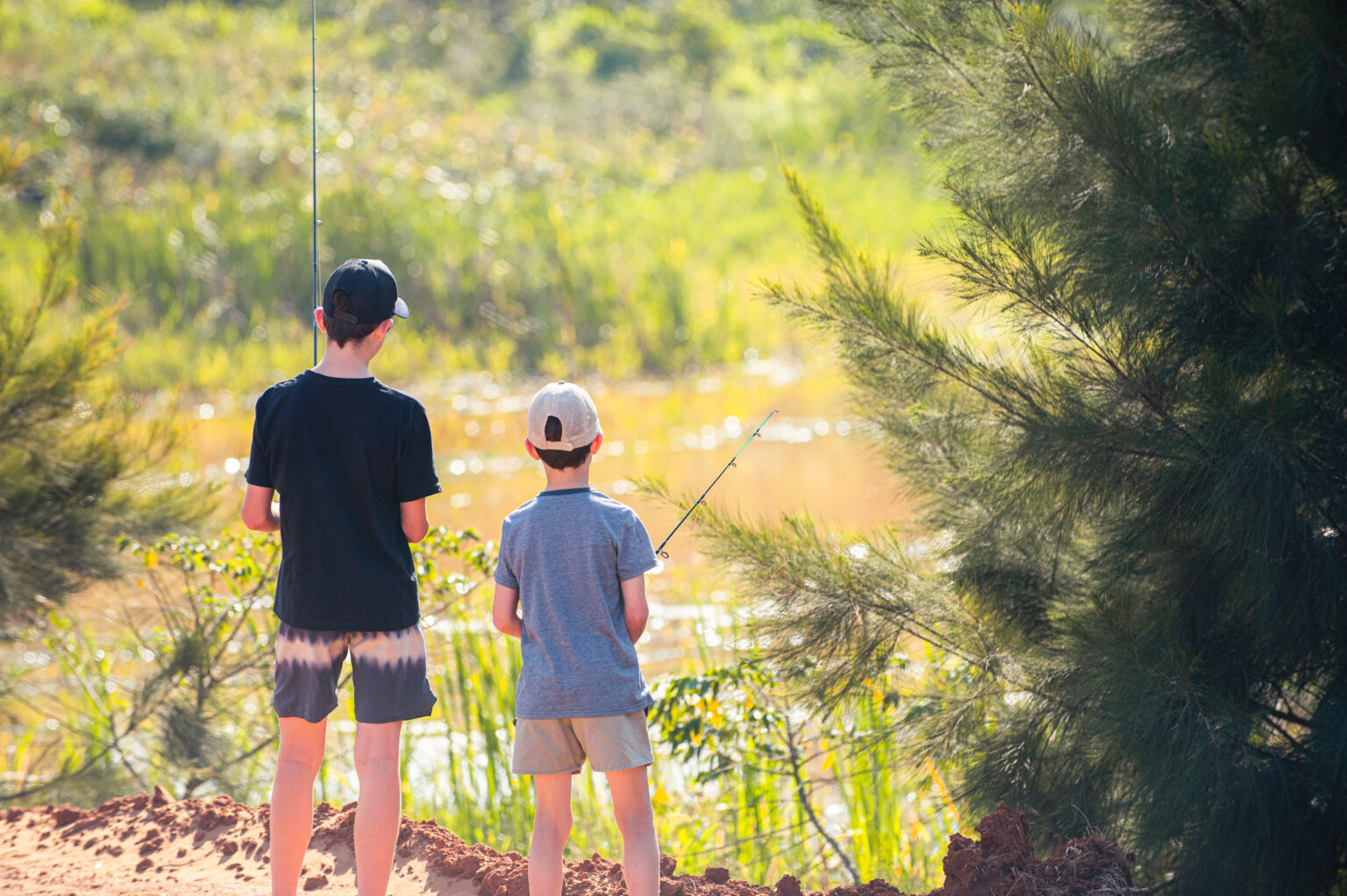 Young residents enjoying the wetland environment at Lalela Estate